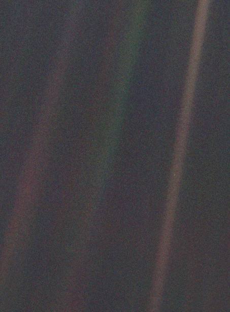 Pale blue dot suspended in a Mote of Dust
