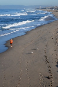 A view down the beach. And a guy running.