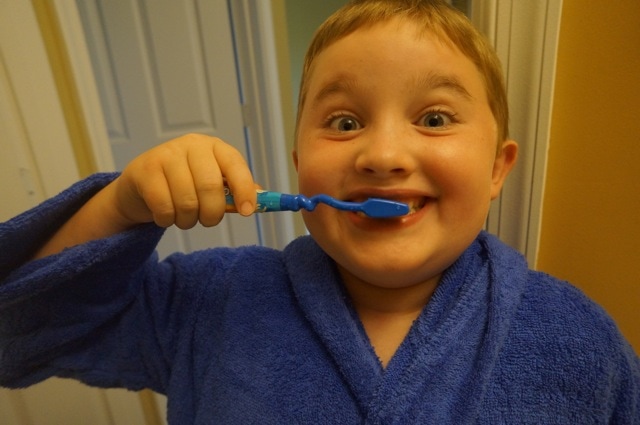 boy brushing his teeth #besweetsmart