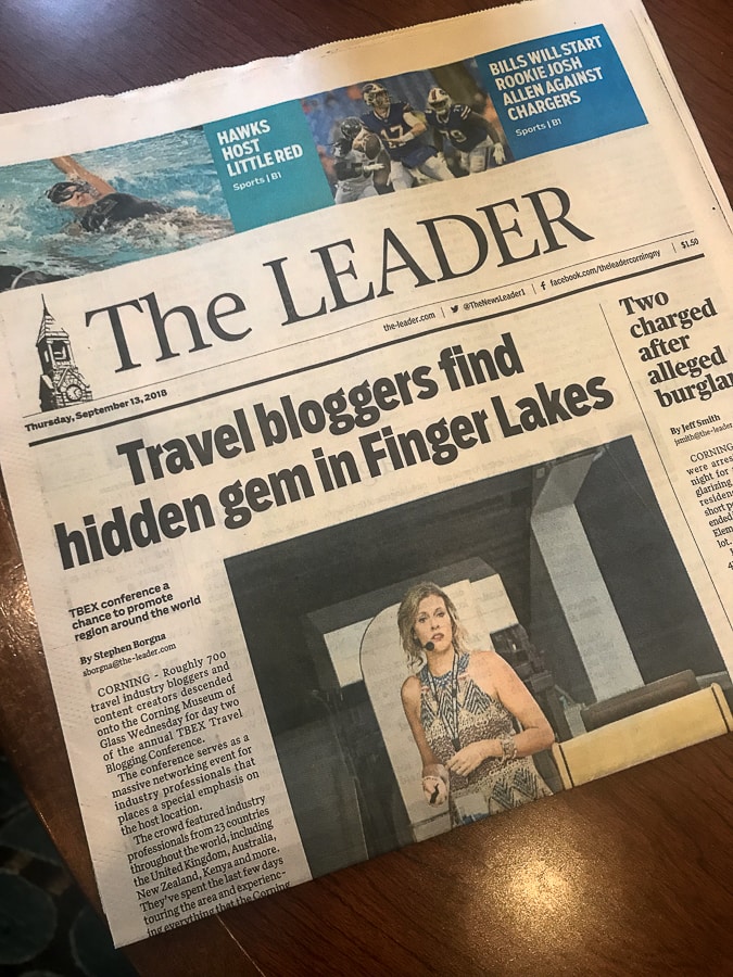 Travel bloggers headline in the newspaper