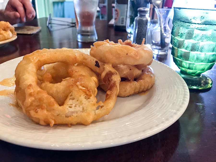 Hand battered onion rings at MoonShadow Cafe