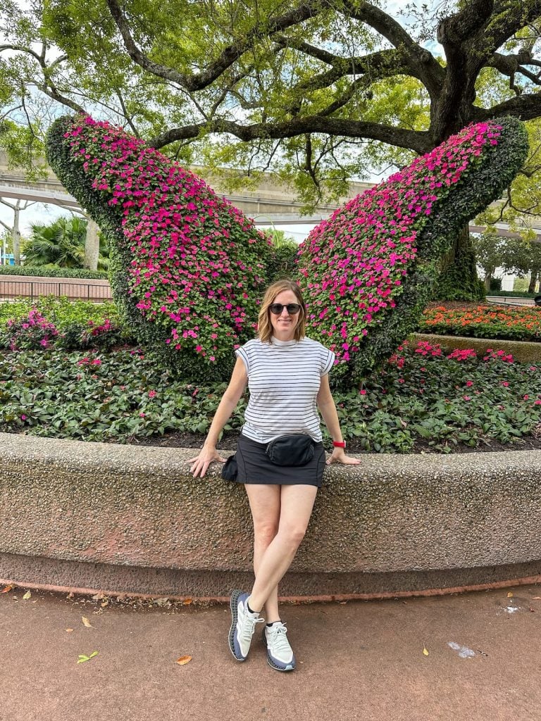 Fadra standing in Epcot in 2025