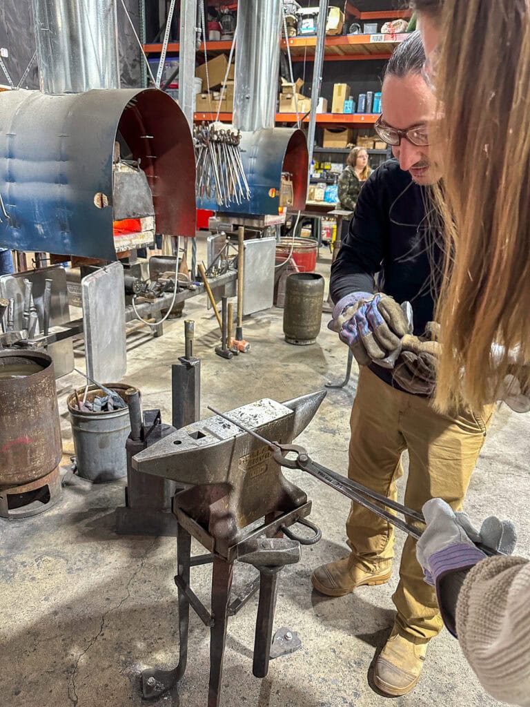 Pounding hot metal