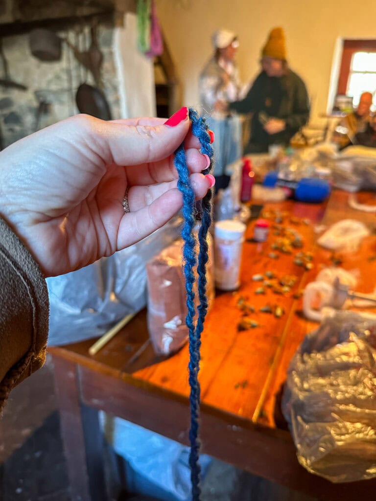 Dyeing yarn at Isaac Meier Homestead