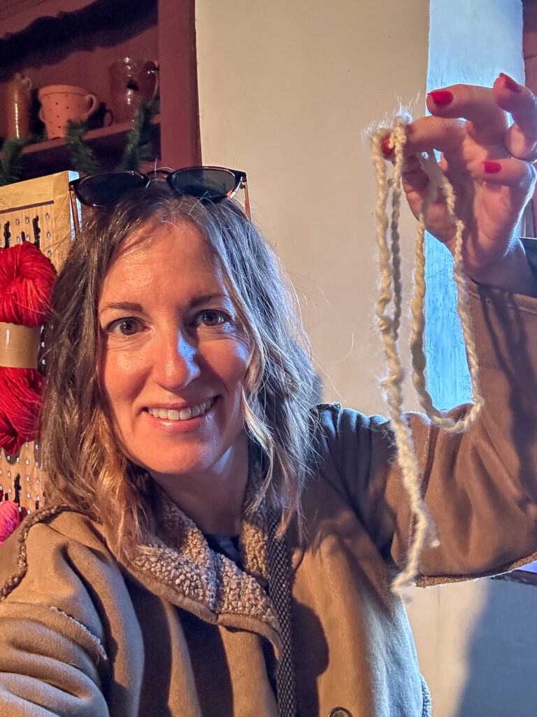 Spinning yarn at Isaac Meier Homestead
